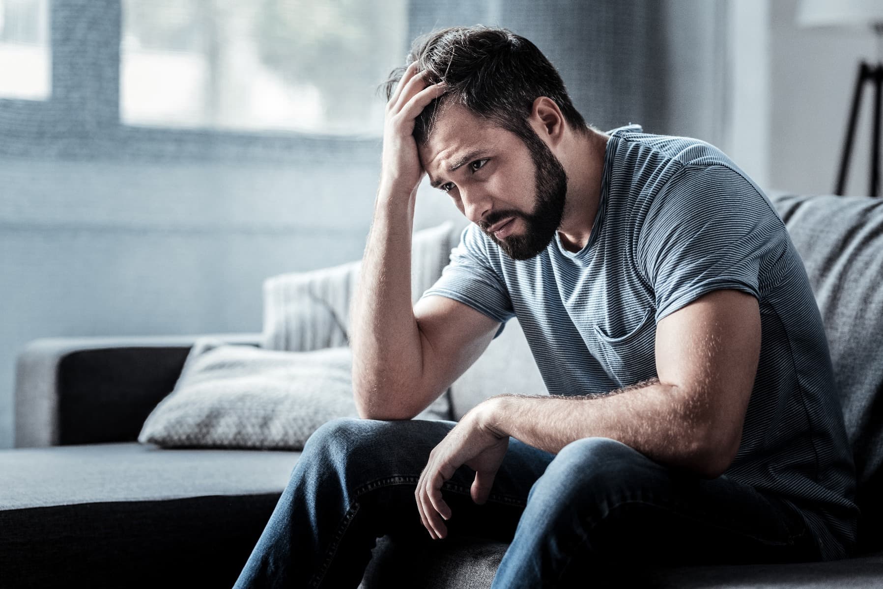 Man holding his head