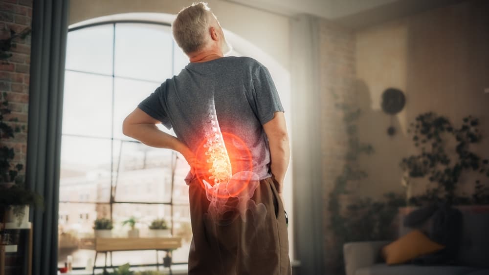 Man suffering with back pain
