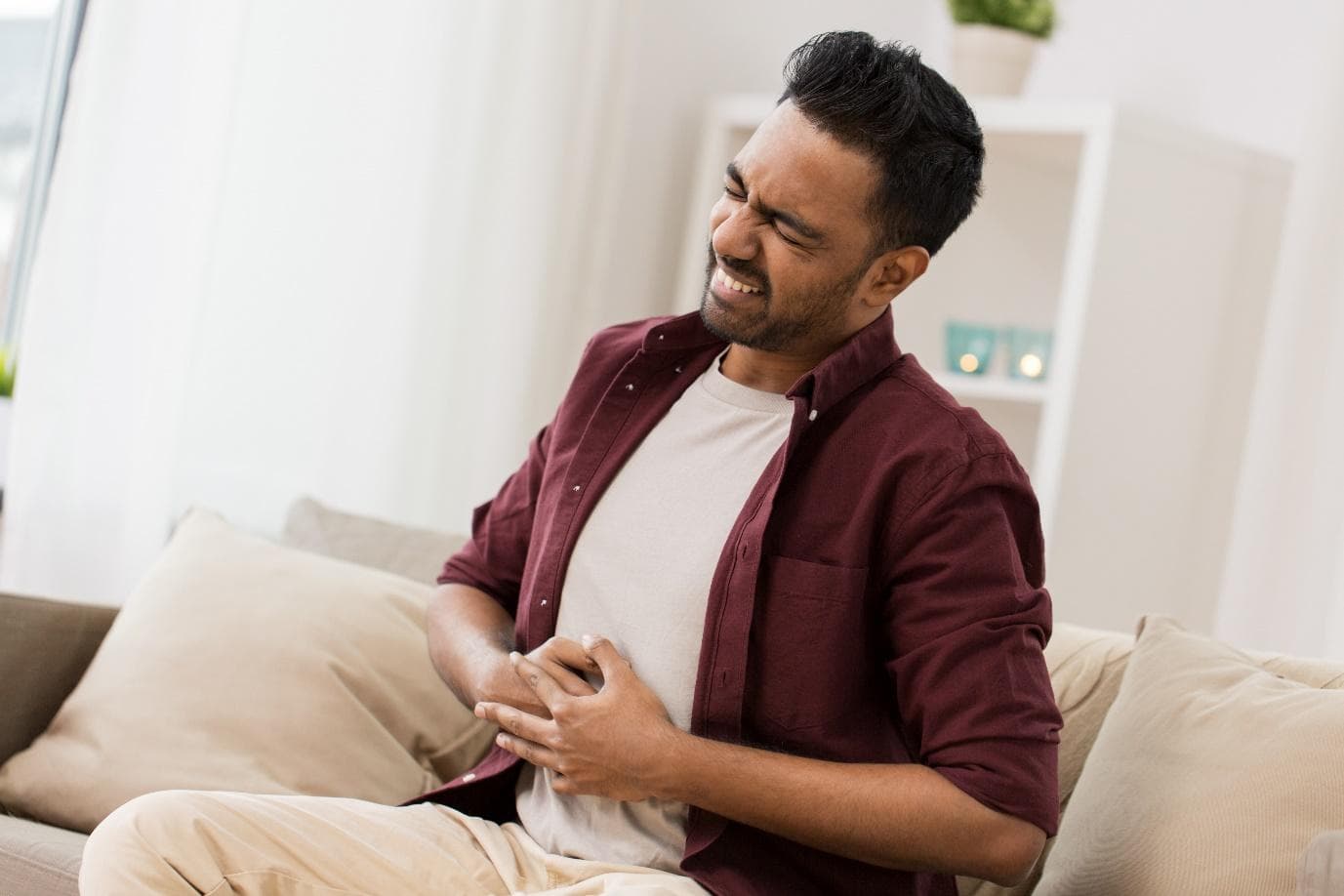 A man experiencing stomach pain